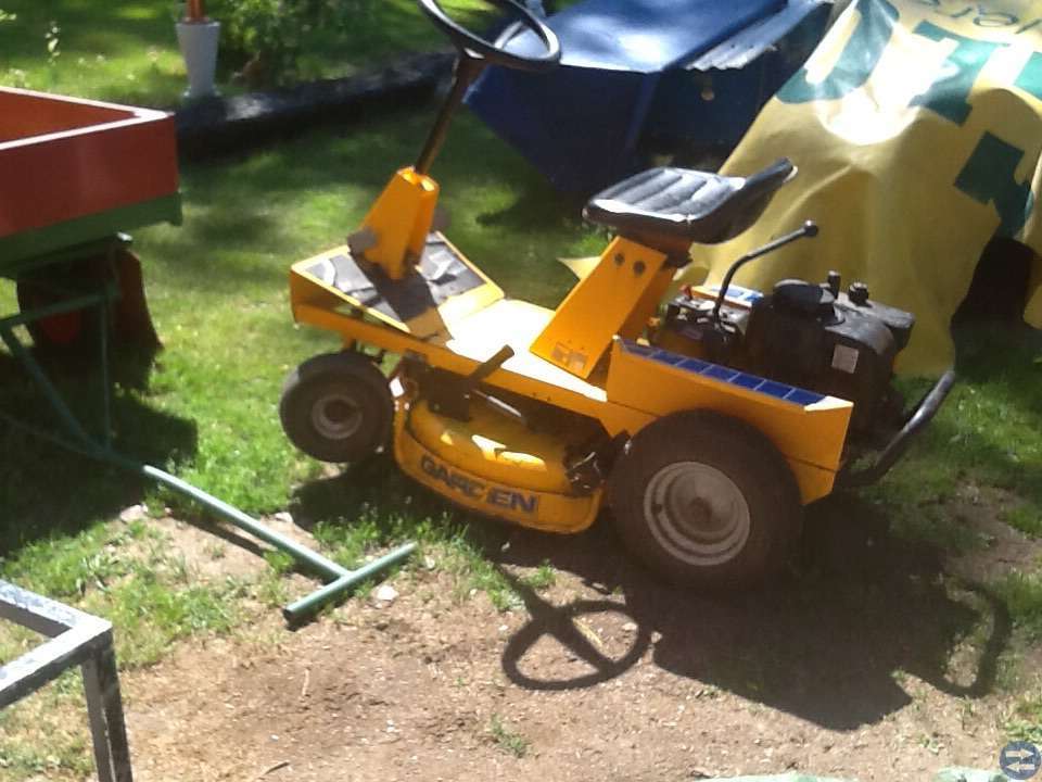 Åk gräsklippare. Gör det själv