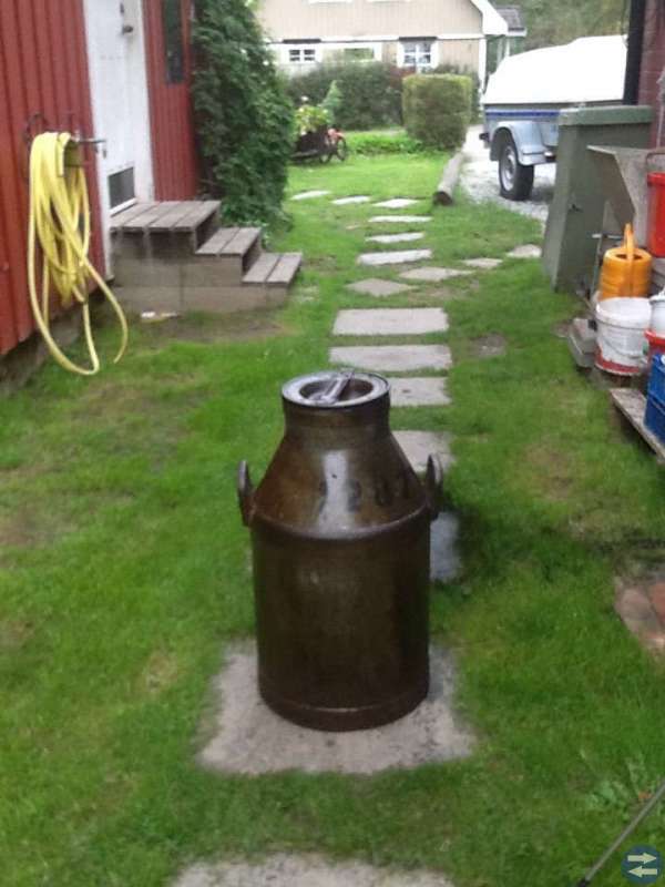 Gammal mjölk kruka