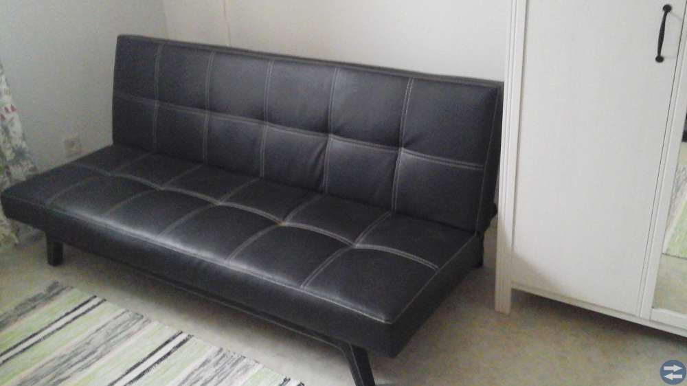 Bäddsoffa i konstläder