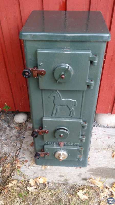 Grönemaljerad Kamin